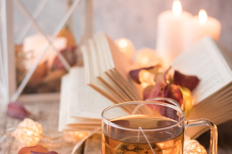 Warm herbal tea in cozy evening light