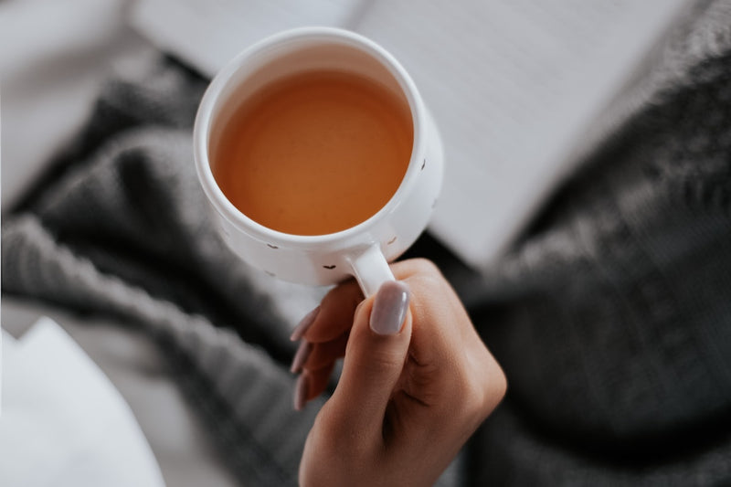 Morning tea ritual in warm light